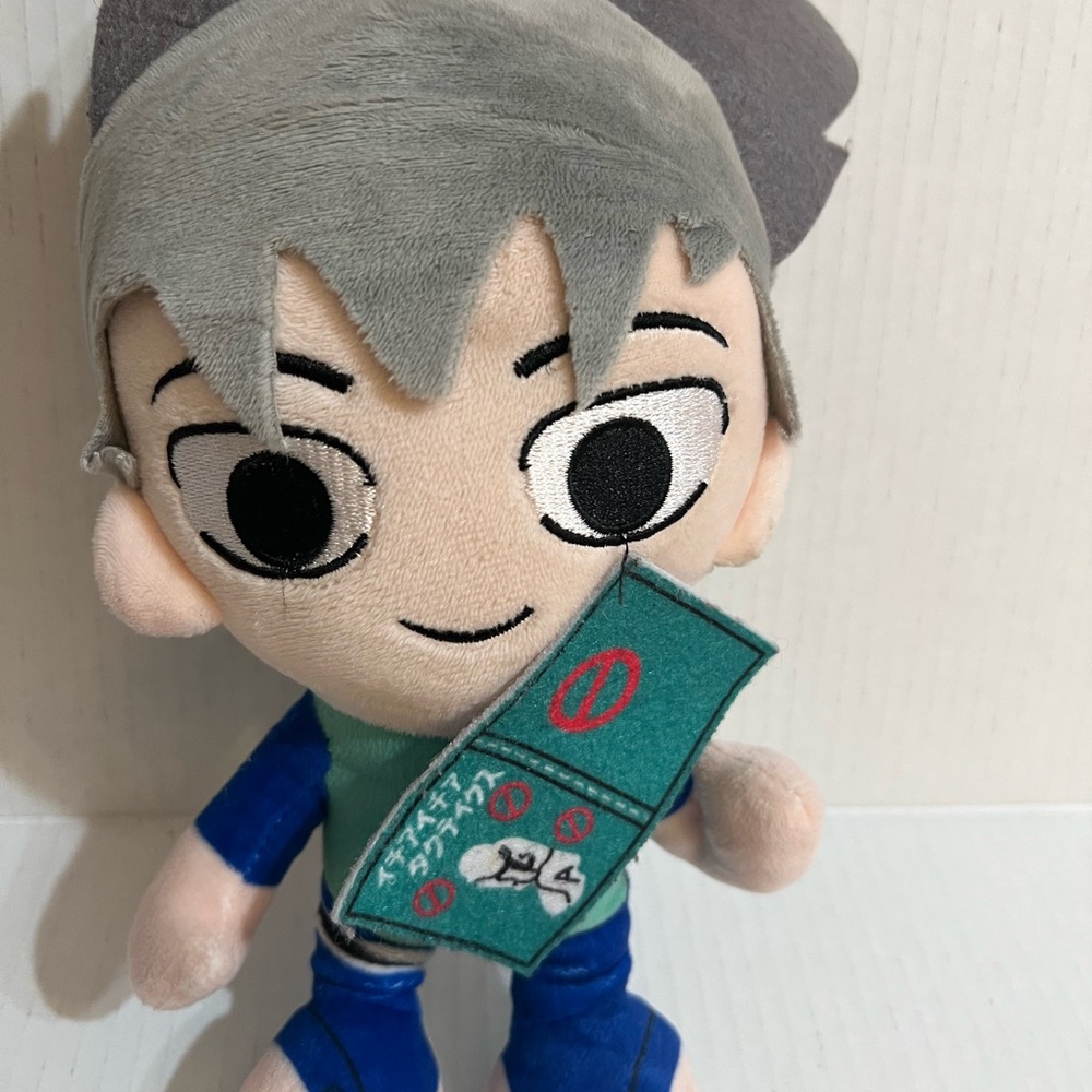 Gray and Blue Plush Toy